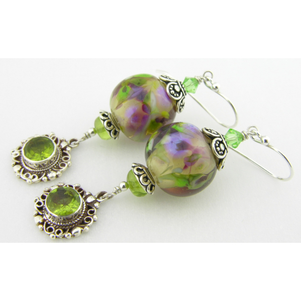 Artisan made purple green earrings with handmade lampwork glass peridot sterling