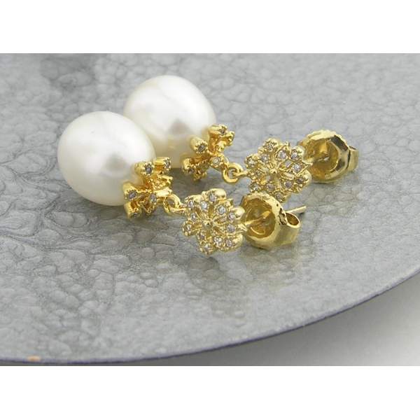 Handmade earrings with freshwater pearls and gold vermeil snowflake earring post