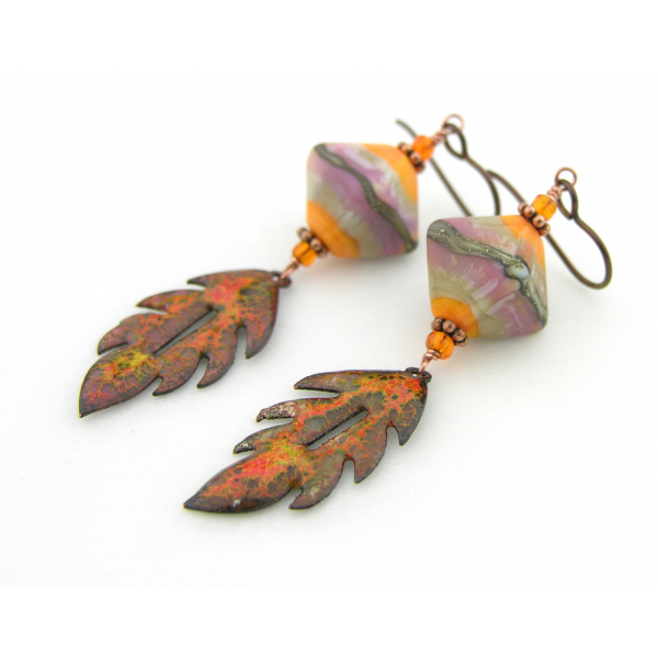 Handmade artisan autumn earrings with orange brown enamel leaves sterling glass