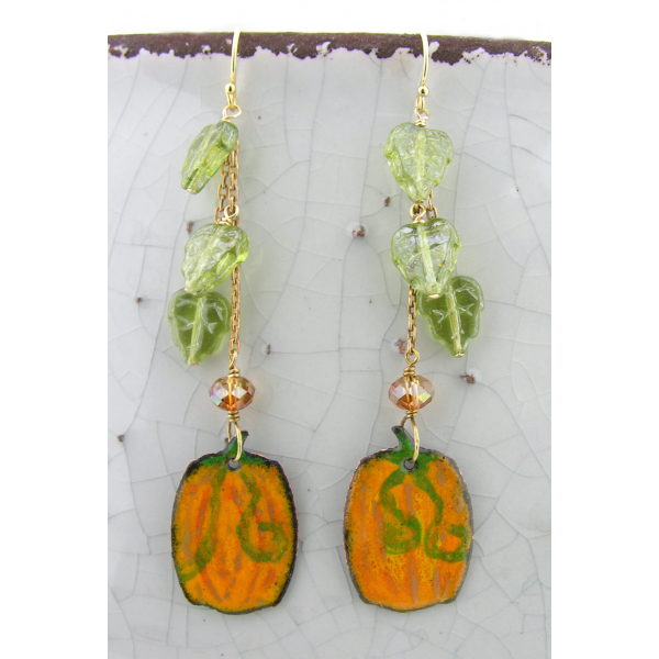 Handmade artisan autumn earrings with orange pumpkins and green leaves gold fill