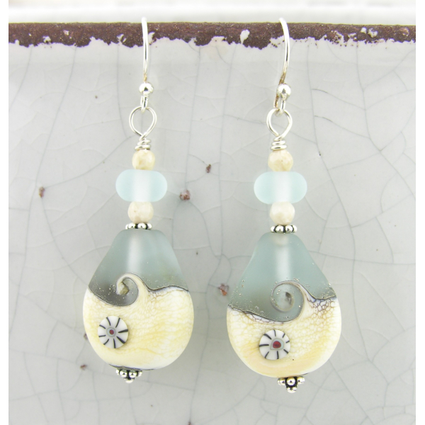 light blue and ivory artisan lampwork with wave in glass, river stone, sterling