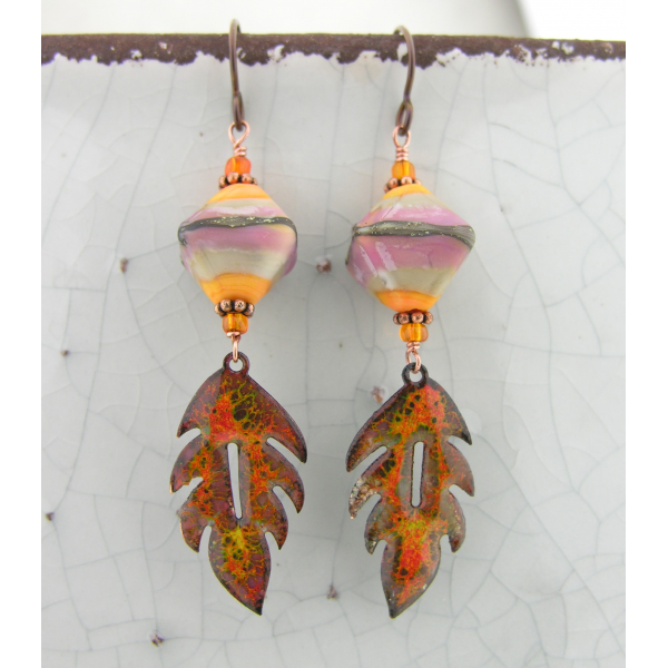 Handmade artisan autumn earrings with orange brown enamel leaves sterling glass