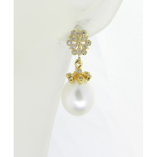 Handmade earrings with freshwater pearls and gold vermeil snowflake earring post
