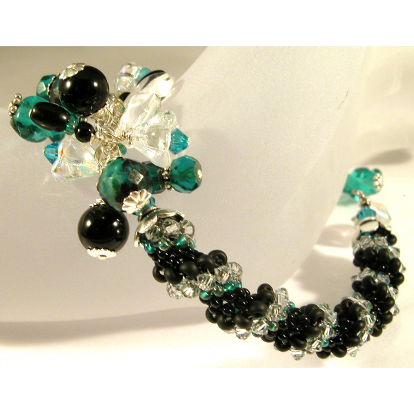 Handmade woven bracelet in black clear teal sterling silver twist crystal onyx