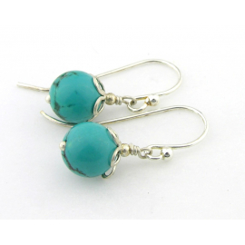 Turquoise and Petals Earrings Artisan short turquoise earrings with sterling silver petals