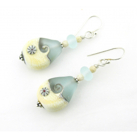 light blue and ivory artisan lampwork with wave in glass, river stone, sterling
