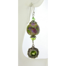 Purple and Peridot Earrings Artisan made purple green earrings with handmade lampwork glass peridot sterling