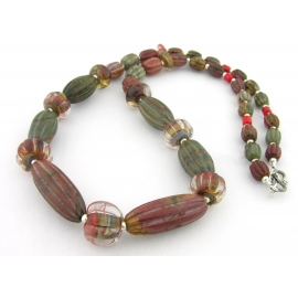 Handmade necklace with carved red creek jasper lampwork coral sterling