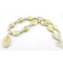 Softly Spoken Necklace (and earrings) flat.jpg