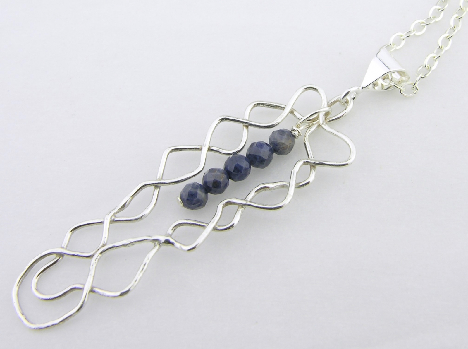 mish mesh and the blues necklace twisted halos blue sapphire